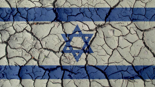 istock Political Crisis Or Environmental Concept Mud Cracks With Israel Flag 1070772410