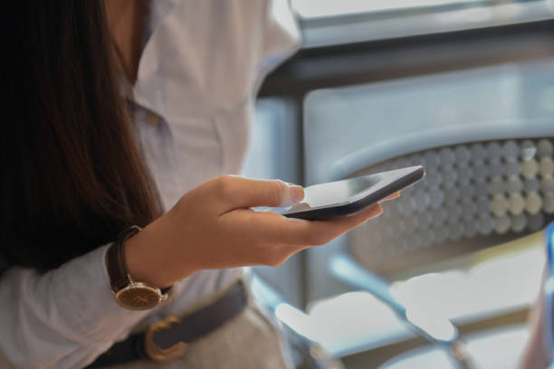 istock Girl office are using a smartphone. 1070774936