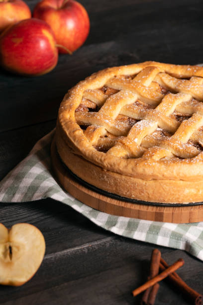 istock Classic apple pie on a kitchen table. Holidays traditional dessert. Homemade pastry 1070775744