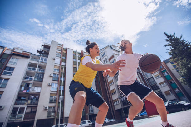 istock Women playing basketball 1070777216