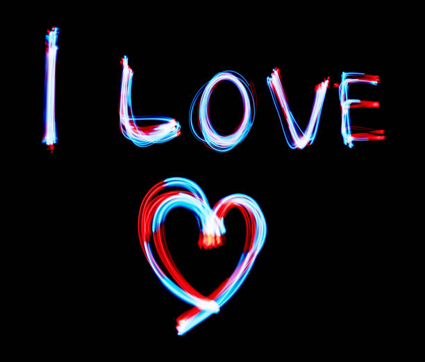 istock Glowing inscription LOVE on a black background 1070781792