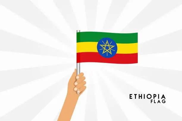 Vector illustration of Vector cartoon illustration of human hands hold Ethiopia flag. Isolated object on white background.