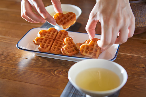 Freshly baked waffle and Chinese tea