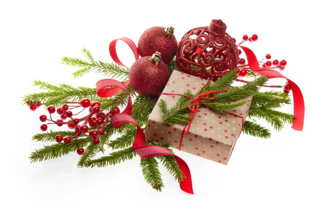 Christmas and New Year ornaments Still life with red sparkling balls, gift box  and fir branches isolated on a white background with reflection. New Year and Christmas decorations 11904 stock pictures, royalty-free photos & images