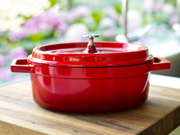 Braising Pan Cast-Iron Braising Pan on a kitchen counter braising pan stock pictures, royalty-free photos & images