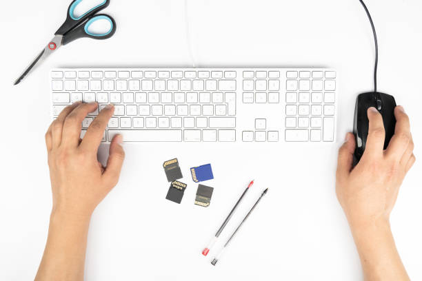 istock Working at home with laptop men writing a blog. Typing on a keyboard. Programmer or computer hacker 1070821386