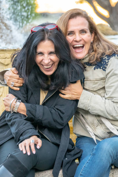 istock smiling mature women posing looking at the camera 1070826126