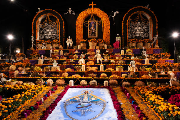 An elaborate altar in the zócalo (city square) constructed for the Día de los Muertos Festival in Oaxaca, Mexico.
(Resubmission note: Altars like this are temporary structures built by the thousands all over Mexico for the Day of the Dead festival in homes and public places. They often contain bread, fruit, prepared food, flowers, and other perishable items. They are taken down and the perishable items are consumed or disposed of immediately after the conclusion of the festival. This one is vary elaborate since it was built in the zócalo of downtown Oaxaca, but it was dismantled by November 3, 2018. Something entirely different will be built next year. Suggesting that these displays would be copyrighted would be like supposing a bunch of flowers at a grave would be copyrighted).