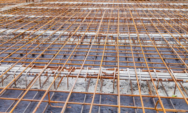 istock Construction of a new building, binding of reinforcement 1070845754