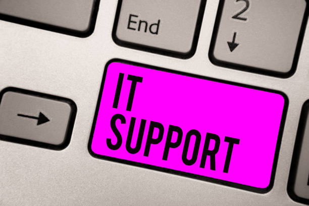 istock Text sign showing It Support. Conceptual photo Lending help about information technologies and relative issues Keyboard purple key Intention create computer computing reflection document. 1070855796