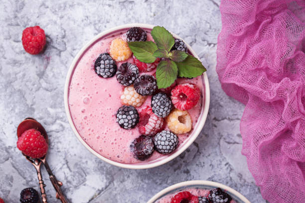 istock Smoothie bowl with frozen berry 1070856456