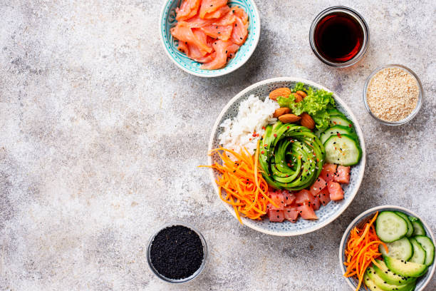 istock Hawaiian poke bowl with salmon, rice and vegetable 1070856570