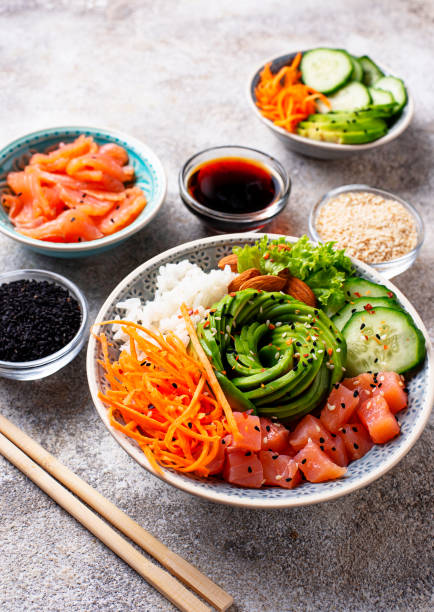istock Hawaiian poke bowl with salmon, rice and vegetable 1070856582