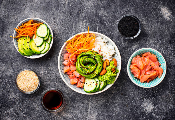 istock Hawaiian poke bowl with salmon, rice and vegetable 1070856586