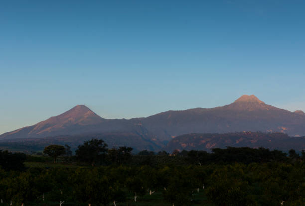 istock Morning light over the volcanoes. 1070865530