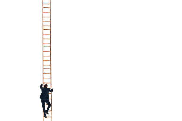 businessman in black suit lift up the stair. career and growth in business concept. white background and copy space. - black ladder white staircase imagens e fotografias de stock