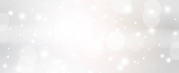 astratto sfocato di colore argento con bokeh e scintillante sfondo di caduta della neve per il concetto di design. - light metallic abstract technology foto e immagini stock