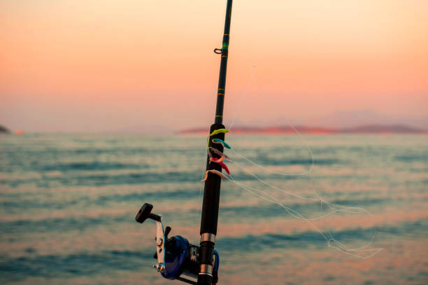 istock Fishing reel, rod and lures in the morning 1070880500