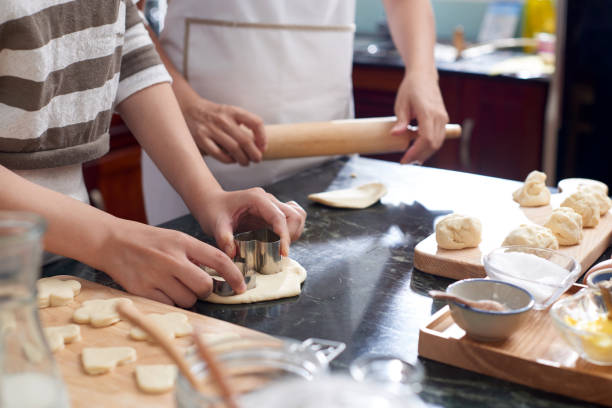 istock Family making cookies 1070895496