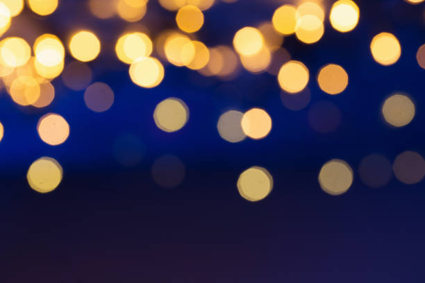 istock blue and golden abstract bokeh background 1070899336