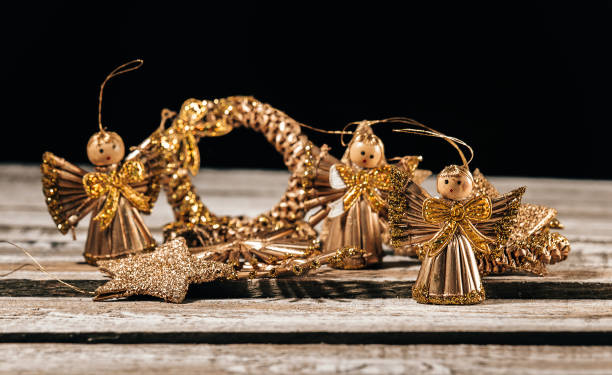 istock Straw with gold glitter christmas bethlehem on wood background 1070900018
