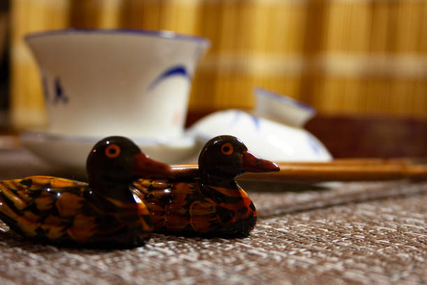 Chinese porcelain, chopsticks and mandarin duck stands