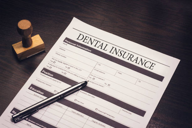 istock Dental insurance form on the wooden table 1070922016