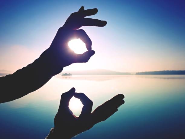 istock Fun shadow play. Shadow of hand symbol. Fingers gesturing 1070926494