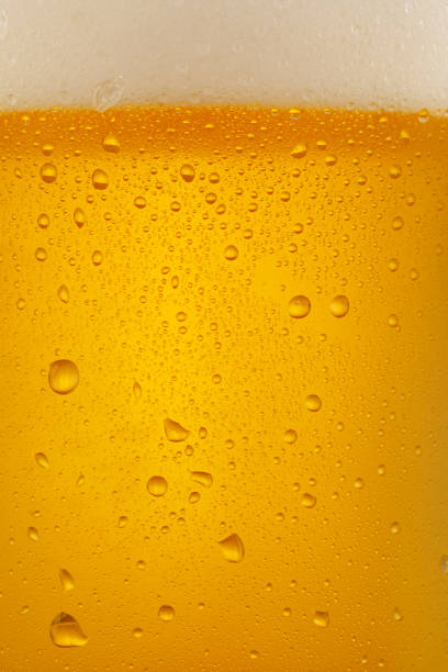 istock Beer Background. Ice Cold Beer Glass With Water Drops Condensation 1070927134