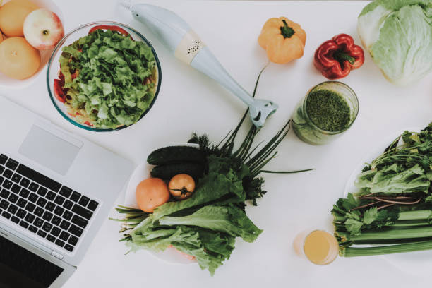 istock Close Up. Vegetables And A Mixer On Kitchen Table. 1070928942
