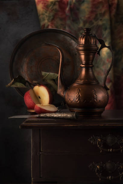 istock Oriental stilllife with copper jug (kumgan) and apple 1070934244