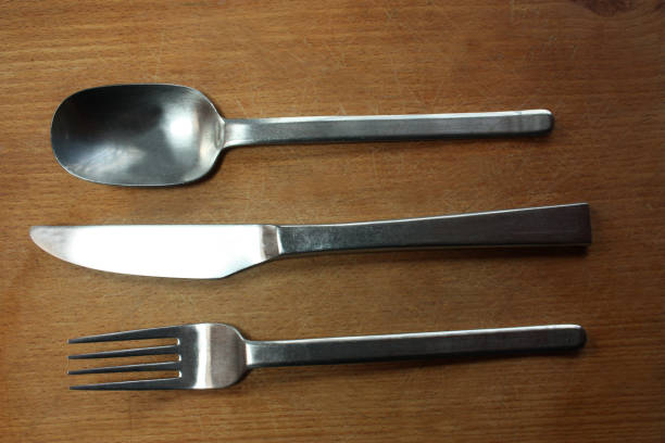 istock Cutlery set on a wooden table 1070934412