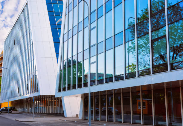 istock Entrance into modern corporate business office building skyscraper 1070935088