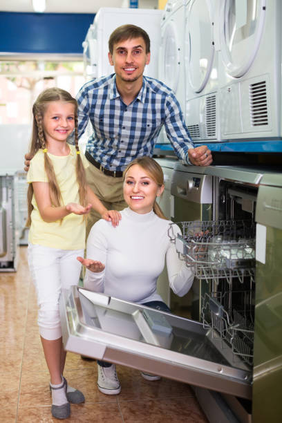 istock Family selecting dishwasher in store 1070935154