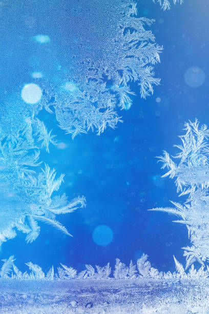 istock Defocused blue background with ice flowers 1070938622