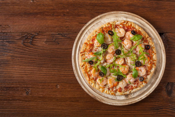 istock Pizza with shrimps. 1070939026