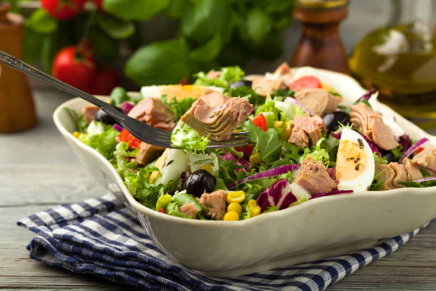 istock Tuna salad with lettuce, eggs and tomatoes. 1070940248