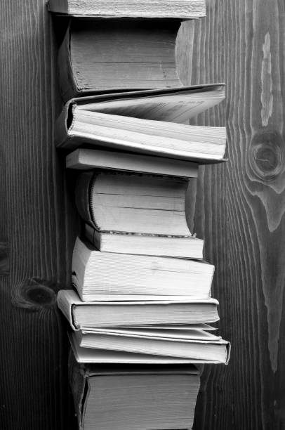 istock books on wood, b&w 1070943456