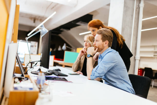 istock Business people collaborating in office and working on project together 1070943994