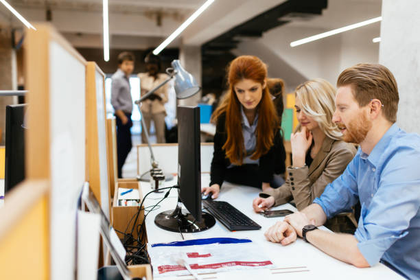 istock Business people collaborating in office and working on project together 1070944002