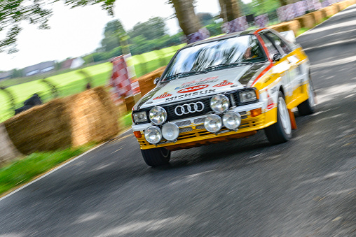 Audi Quattro classic coupe rally car. The Audi Quattro was the first four wheel drive rally car and highly successful in the 1980s. The car is doing a demonstration drive during the 2017 Classic Days event at Schloss Dyck.
