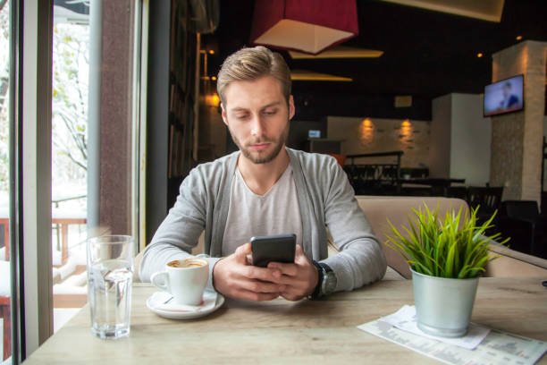 istock Man in cafe - The hard work that goes into running a cafe 1070958614