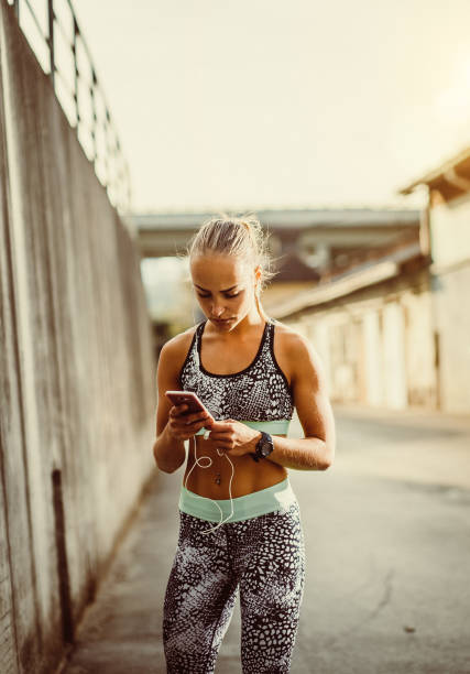 istock Young Athlete Listening to Music 1070960736