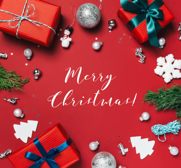 istock Red christmas Background with holiday decorations and Merry Christmas text. 1070965278