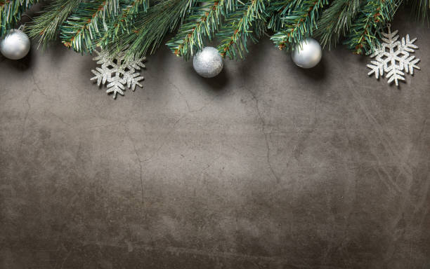 istock Christmas black background with ornaments in silver decor. Top view with copy space 1070967286