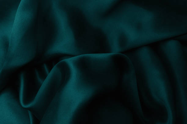 istock Green blue satin silk, elegant fabric for backgrounds 1070968600