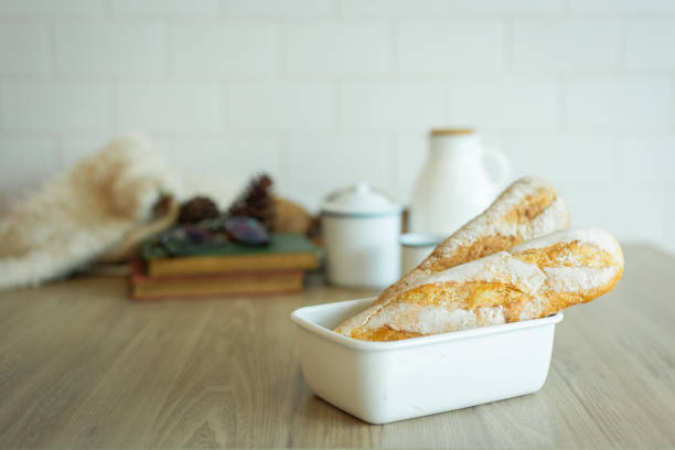 istock composition of bread with ceramic bowl on wood table. 1070970484