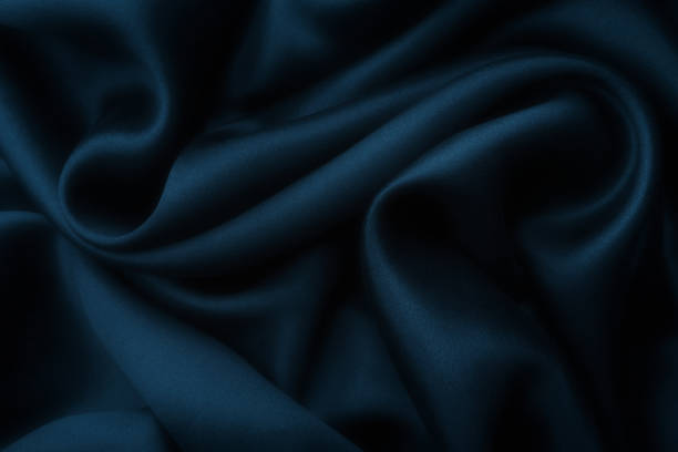 istock Blue satin silk, elegant fabric for backgrounds 1070973964