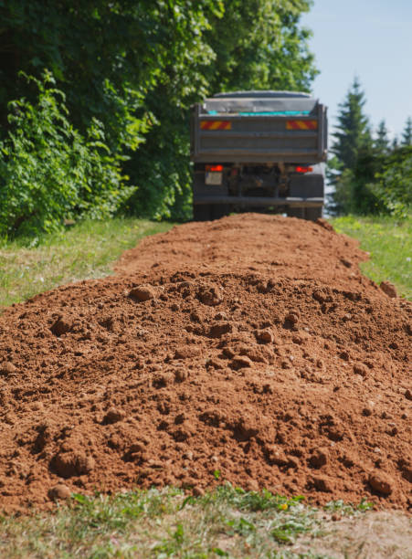 istock Reconstruction of soil road. 1070974332