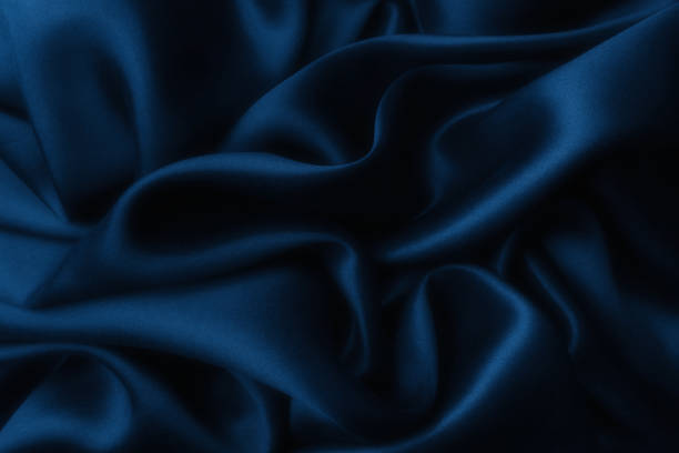 istock Blue satin silk, elegant fabric for backgrounds 1070975534